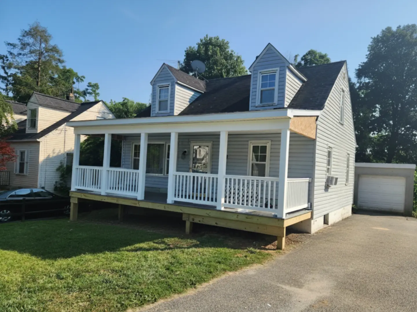 Wooden front porch is Glenelg and Central Maryland